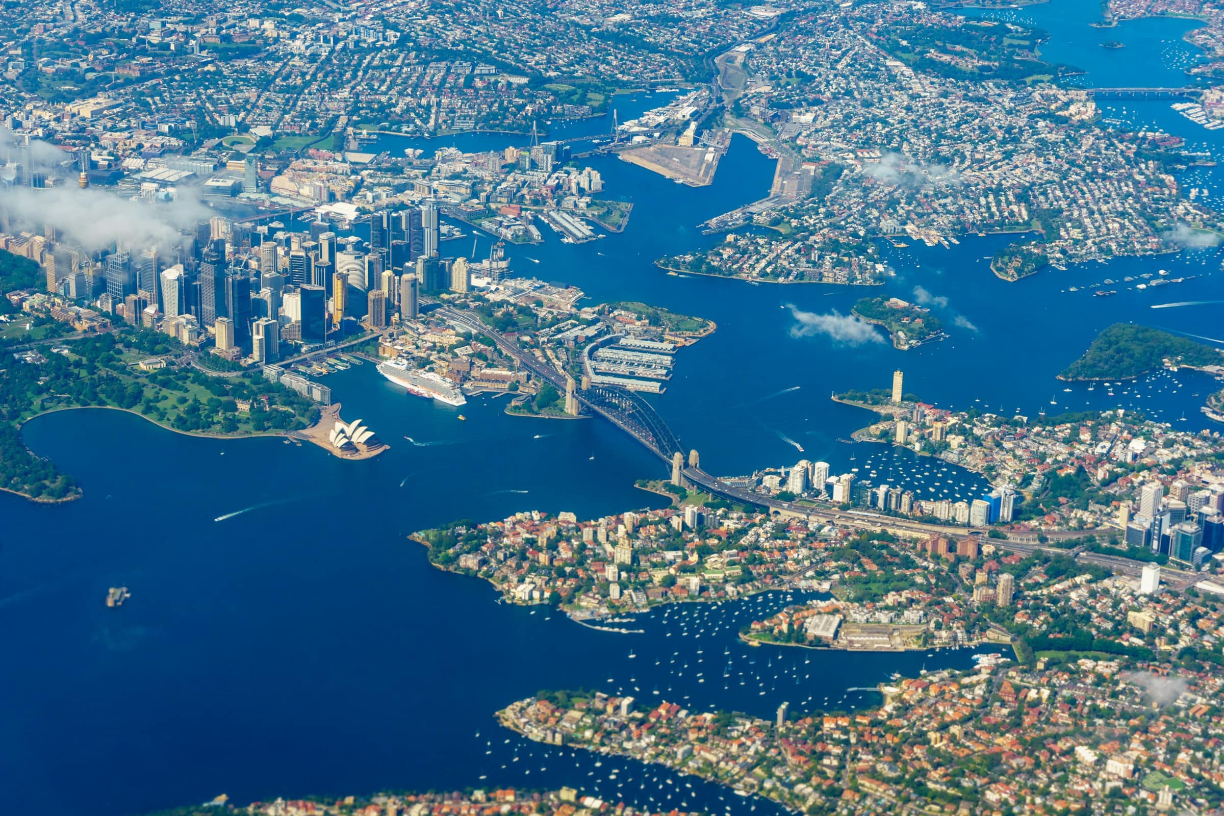 Aerial view of Sydney Harbour with the CBD, Opera House and surrounding suburbs